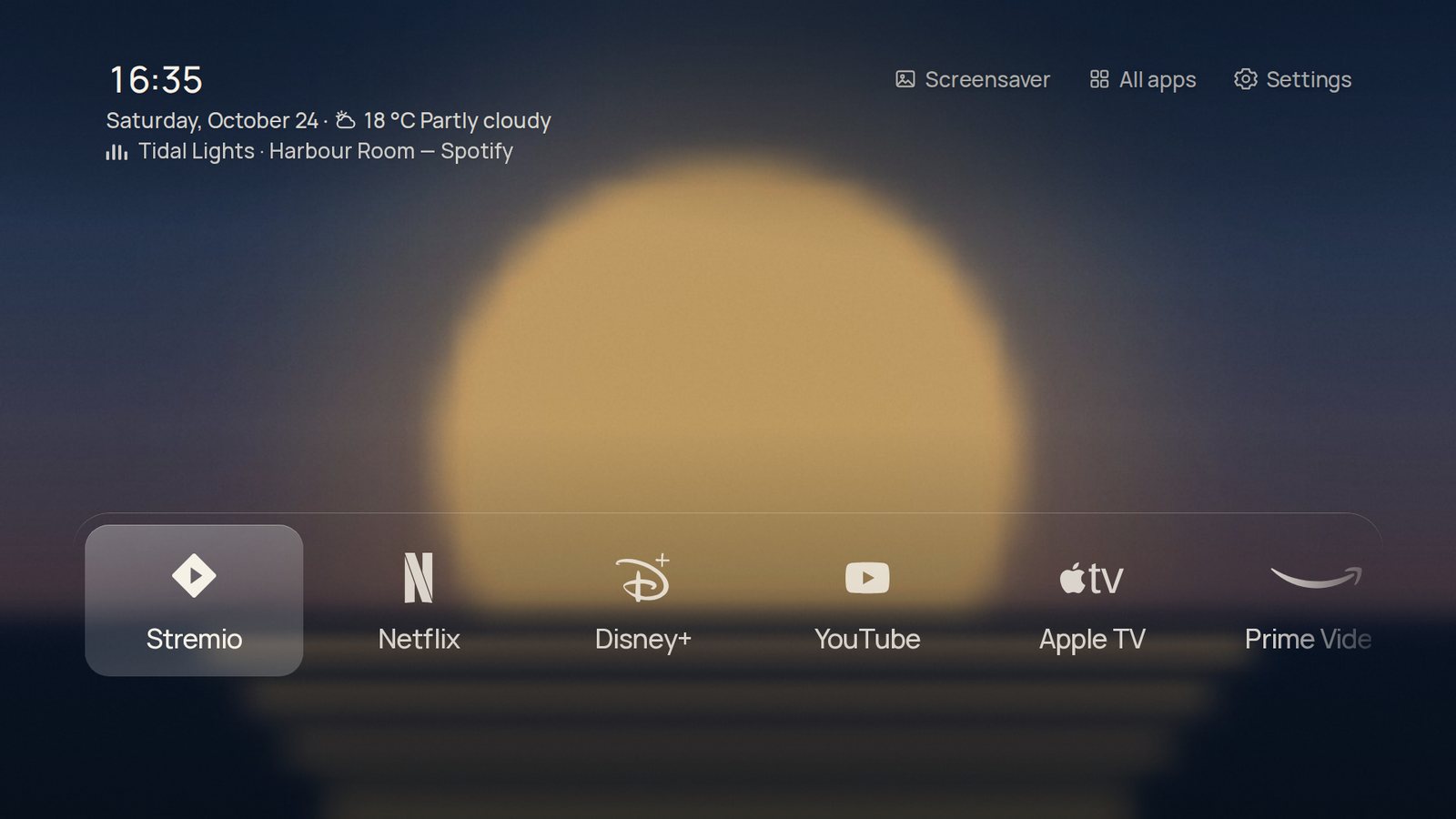 Home with a blurred album cover as the background and Tidal Lights, Harbour Room, Spotify under the clock